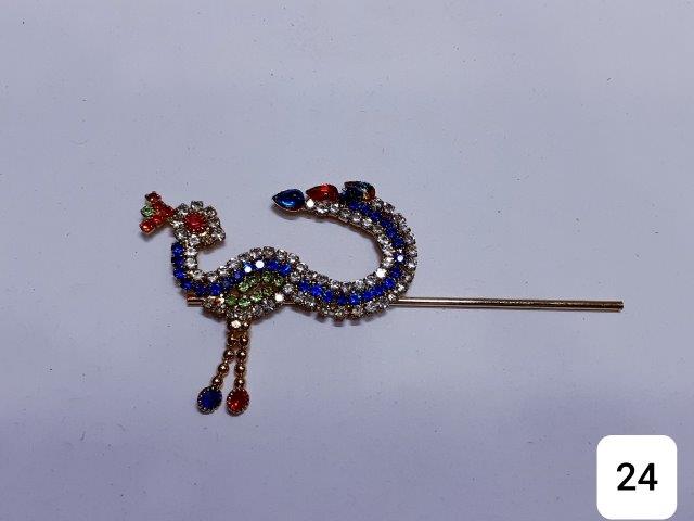 GOLDEN 3'' PEACOCK SHAPED FULL OF SHINY STONES WITH HANGING.