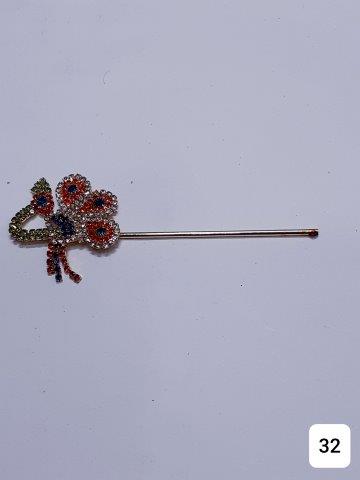 GOLDEN 4'' VERY ATTRACTIVE PEACOCK DESIGN DECORATED WITH STONES.