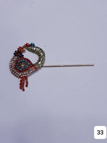 GOLDEN 3''ITS UNIQUE PIECE DECORATED WITH MULTISTONES.