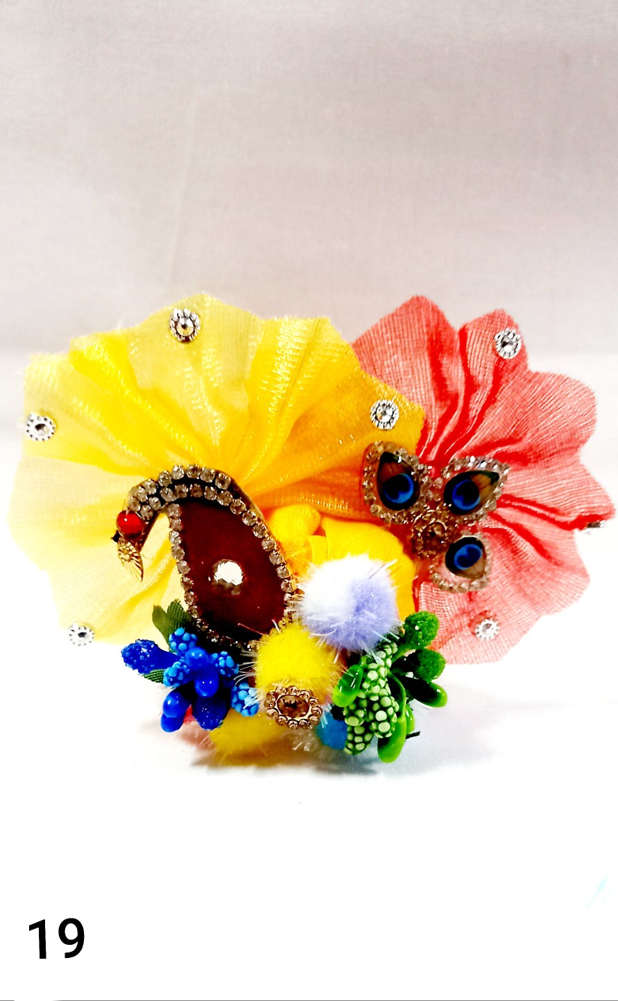 Decorated pagdi with lace,stones, flowers and kerry